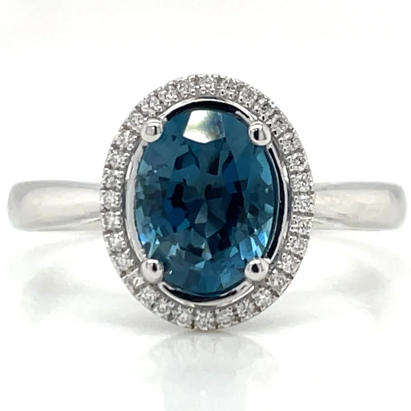 9ct White Gold Earth Grown 1.62ct London Blue Topaz And Diamond Halo Ring