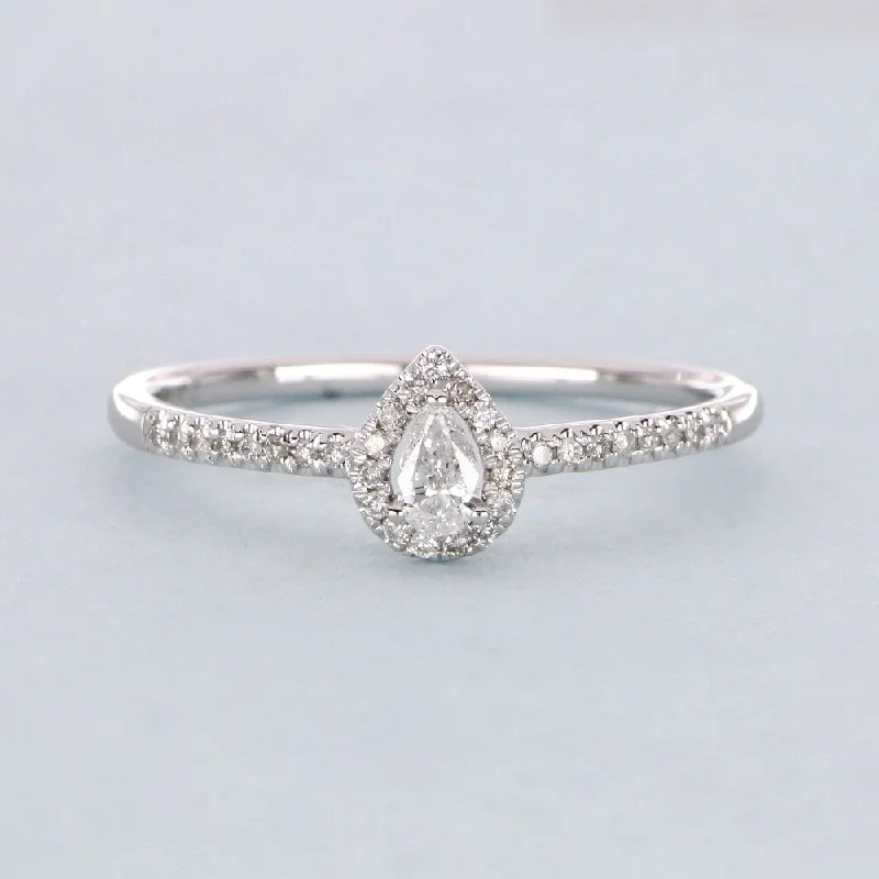 1/5ct TDW Pear Shape Diamond Halo Ring in 10k Gold by De Couer